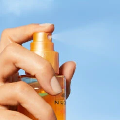 NUXE Sun Moisturising Protective Milky Hair Oil -Korres Store 3264680025341 3 32835.1688545903